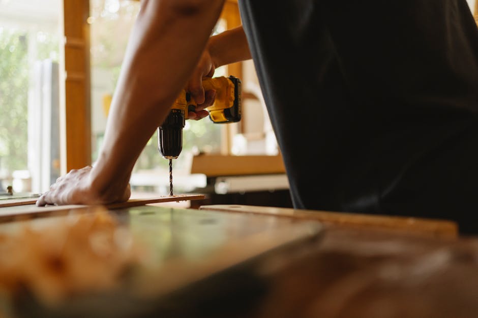 Carpenter installing a wooden door